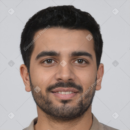 Joyful latino young-adult male with short  black hair and brown eyes