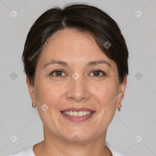 Joyful white adult female with short  brown hair and brown eyes