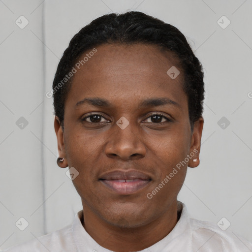 Joyful black young-adult female with short  black hair and brown eyes