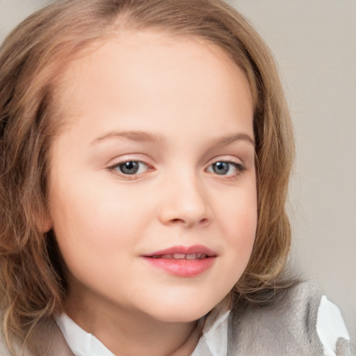 Joyful white child female with medium  brown hair and blue eyes