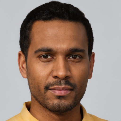 Neutral black young-adult male with short  black hair and brown eyes