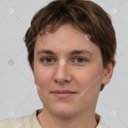 Joyful white young-adult female with short  brown hair and grey eyes