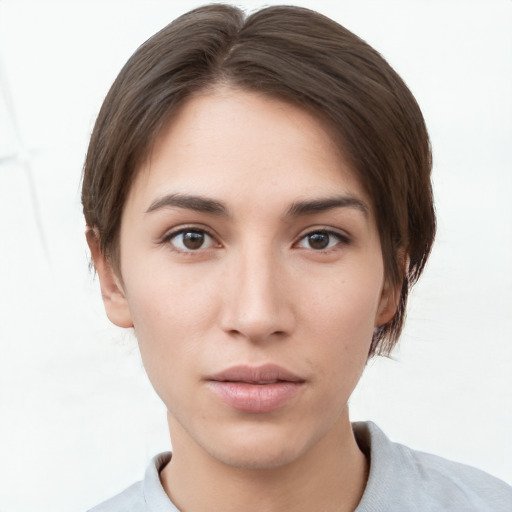 Neutral white young-adult female with short  brown hair and brown eyes