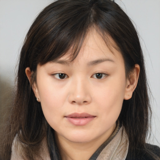 Neutral asian young-adult female with long  brown hair and brown eyes