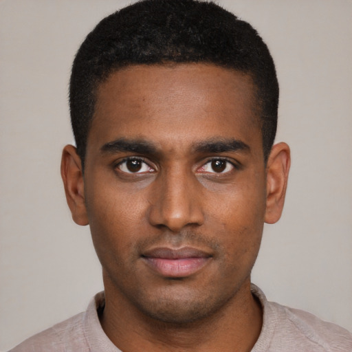Neutral black young-adult male with short  black hair and brown eyes