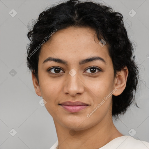 Joyful latino young-adult female with short  brown hair and brown eyes