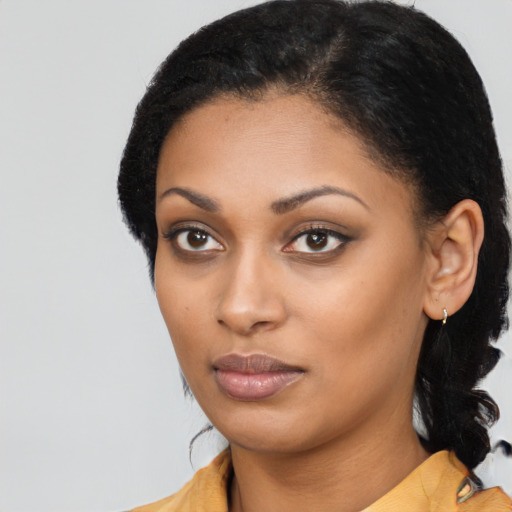 Neutral black young-adult female with long  black hair and brown eyes