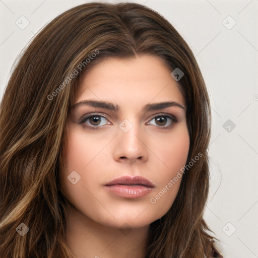 Neutral white young-adult female with long  brown hair and brown eyes