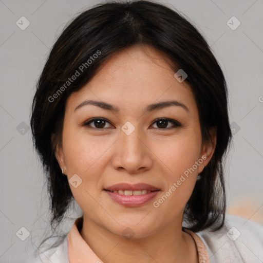 Joyful latino young-adult female with medium  brown hair and brown eyes