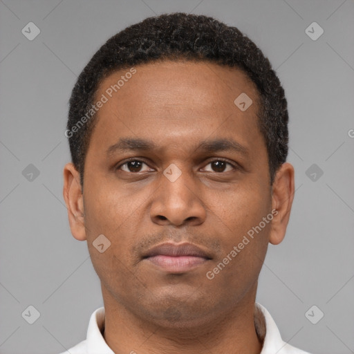 Neutral latino young-adult male with short  brown hair and brown eyes