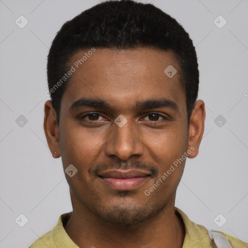 Joyful black young-adult male with short  black hair and brown eyes