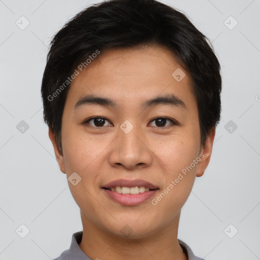 Joyful asian young-adult male with short  brown hair and brown eyes