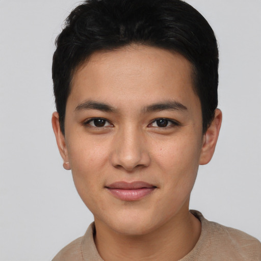 Joyful asian young-adult male with short  brown hair and brown eyes