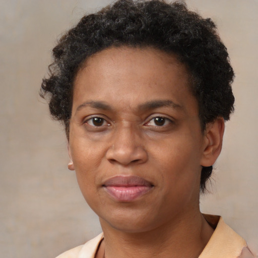 Neutral black adult female with short  brown hair and brown eyes