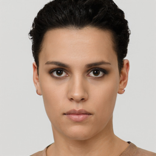 Neutral white young-adult female with short  black hair and brown eyes