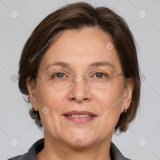 Joyful white adult female with medium  brown hair and grey eyes