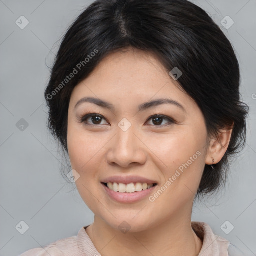 Joyful asian young-adult female with medium  brown hair and brown eyes