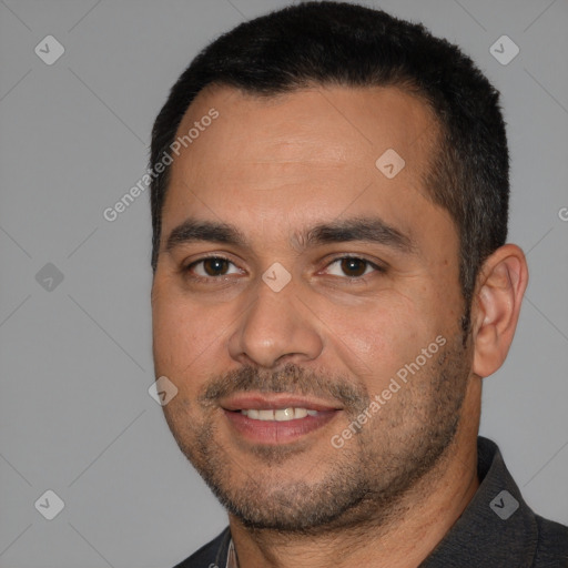 Joyful white young-adult male with short  black hair and brown eyes