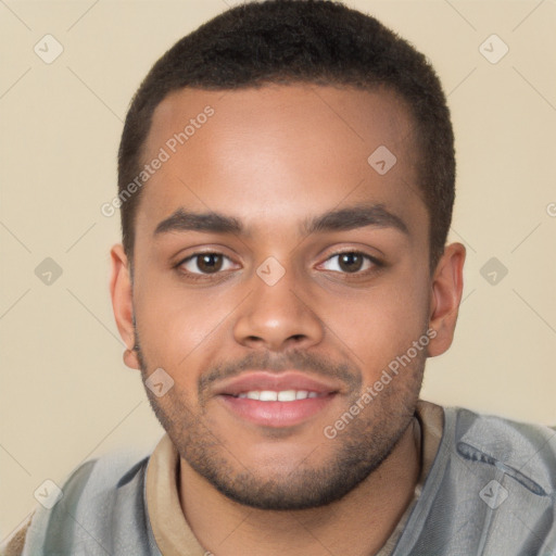 Joyful black young-adult male with short  brown hair and brown eyes