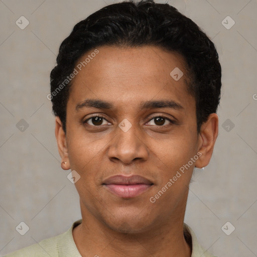 Joyful black young-adult male with short  black hair and brown eyes