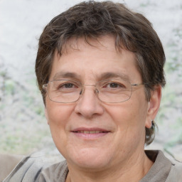 Joyful white middle-aged female with short  brown hair and brown eyes