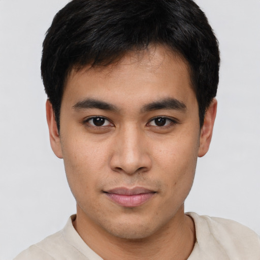 Neutral asian young-adult male with short  brown hair and brown eyes