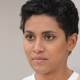 Joyful latino young-adult female with short  brown hair and brown eyes