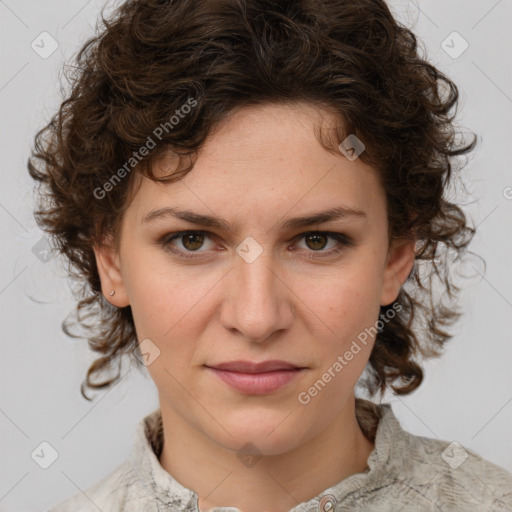 Joyful white young-adult female with medium  brown hair and green eyes