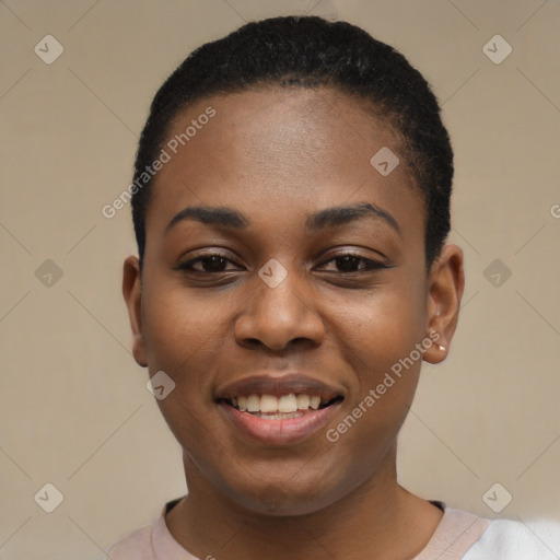 Joyful black young-adult female with short  black hair and brown eyes