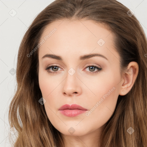 Neutral white young-adult female with long  brown hair and brown eyes