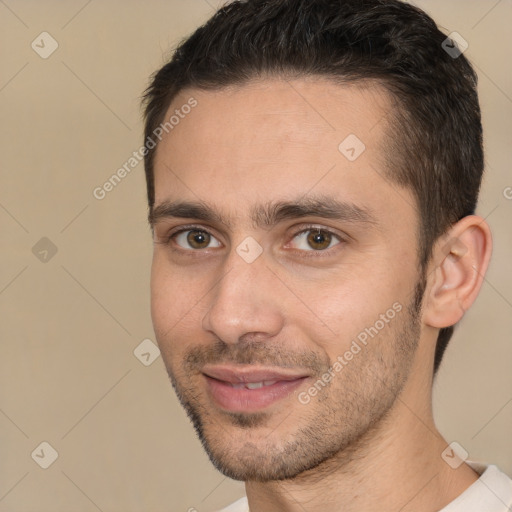 Joyful white young-adult male with short  brown hair and brown eyes