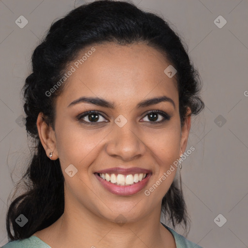 Joyful latino young-adult female with medium  brown hair and brown eyes