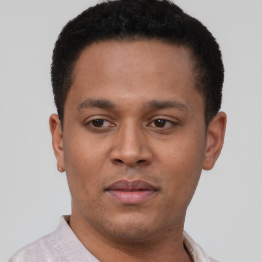 Neutral latino young-adult male with short  brown hair and brown eyes