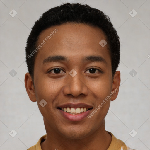 Joyful latino young-adult male with short  black hair and brown eyes