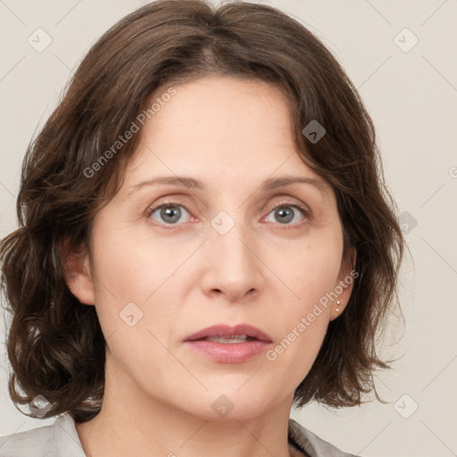 Neutral white young-adult female with medium  brown hair and grey eyes