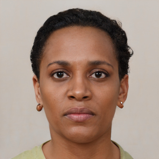 Neutral black young-adult female with short  black hair and brown eyes
