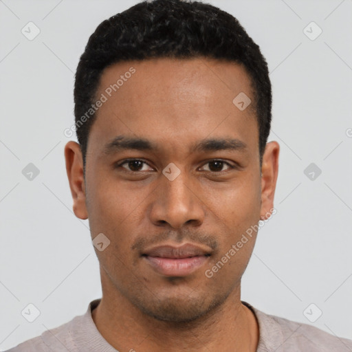 Neutral latino young-adult male with short  black hair and brown eyes