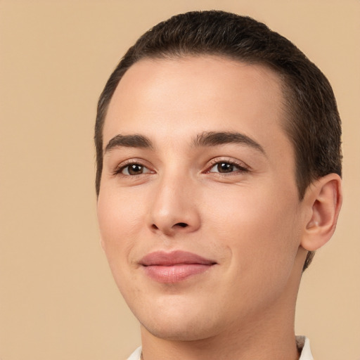 Joyful white young-adult male with short  brown hair and brown eyes