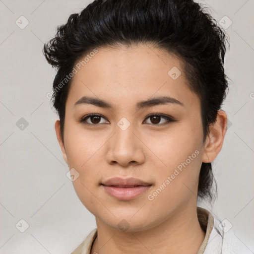 Joyful asian young-adult female with short  brown hair and brown eyes