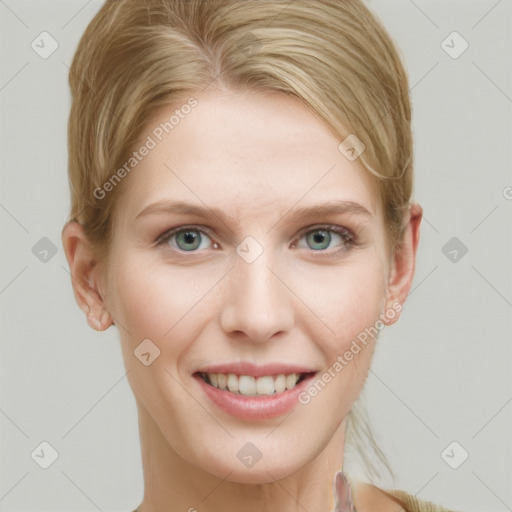 Joyful white young-adult female with short  brown hair and blue eyes