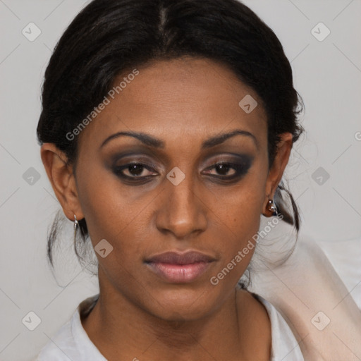 Joyful black young-adult female with medium  brown hair and brown eyes