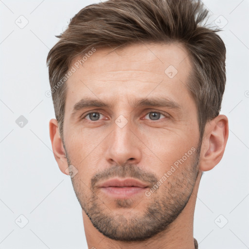 Neutral white young-adult male with short  brown hair and brown eyes