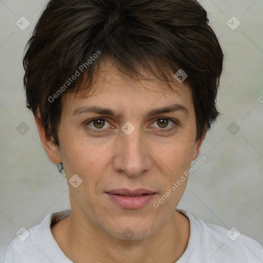 Joyful white adult female with short  brown hair and brown eyes