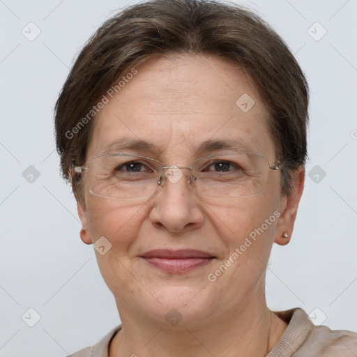 Joyful white adult female with short  brown hair and brown eyes