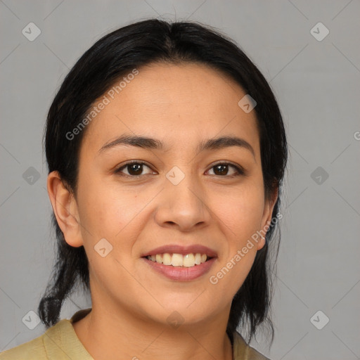 Joyful latino young-adult female with medium  brown hair and brown eyes