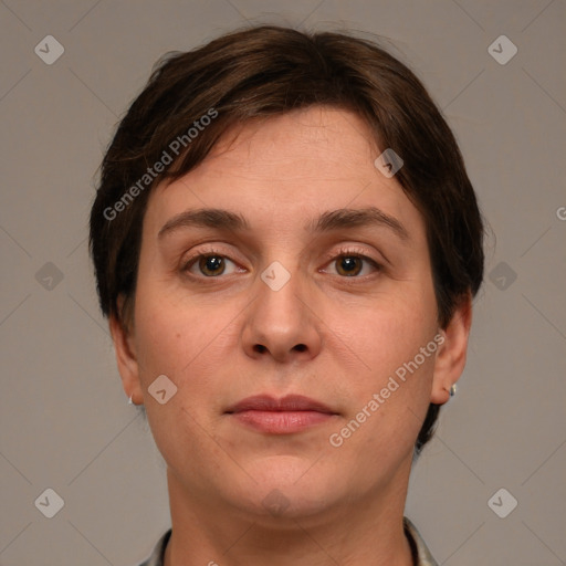 Joyful white adult female with short  brown hair and grey eyes