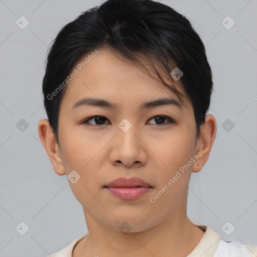 Joyful asian young-adult female with short  black hair and brown eyes