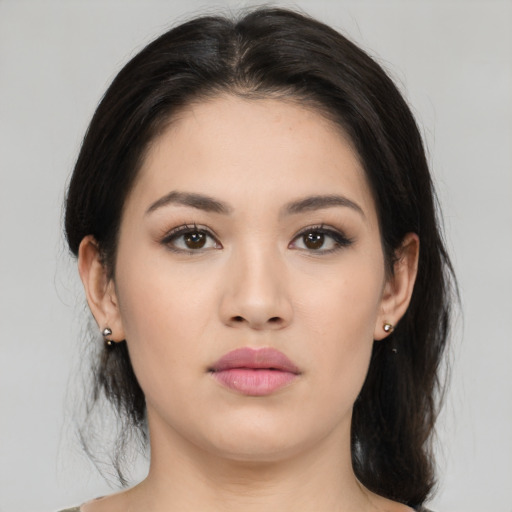 Neutral asian young-adult female with medium  brown hair and brown eyes