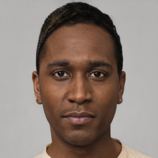 Neutral black young-adult male with short  black hair and brown eyes