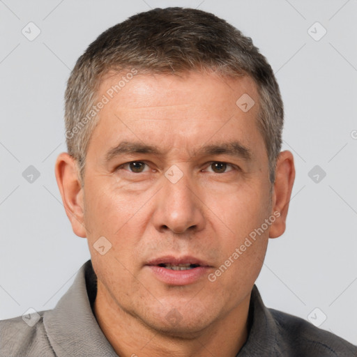 Neutral white middle-aged male with short  brown hair and brown eyes